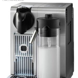 Silver Espresso Machine with Milk Frother.
DeLonghi Nespresso.